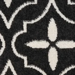 Black & Ivory Quatrefoil Indoor/Outdoor Rug, 8x10