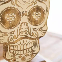 Carved Wooden Skull Statue