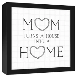 Mom Turns a House into a Home Framed Canvas Print