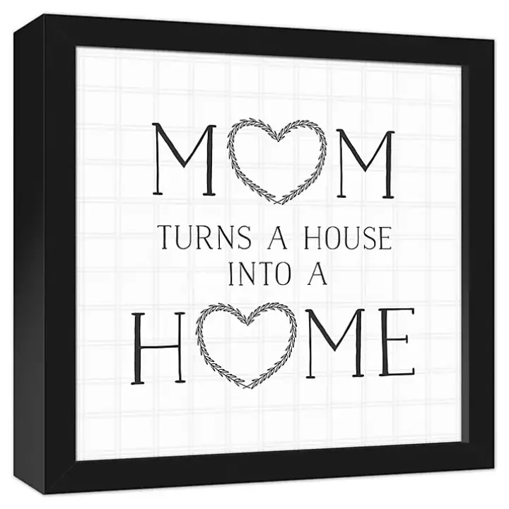 Mom Turns a House into a Home Framed Canvas Print