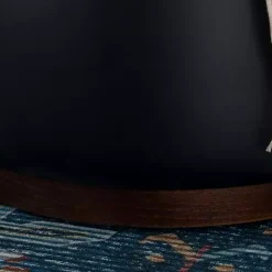 Round Black Faux Leather Storage Ottoman