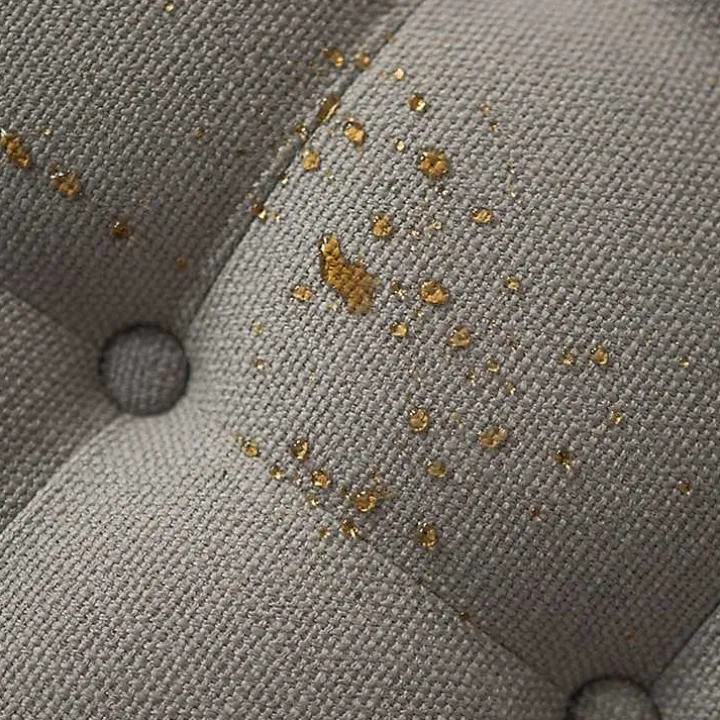 Round Gray Cepheus Tufted Ottoman