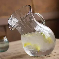 Tilted Ribbed Glass Pitcher
