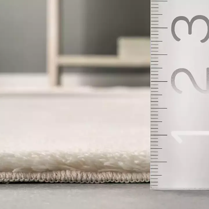 Whitlow Cream Shag Washable Area Rug, 5x8